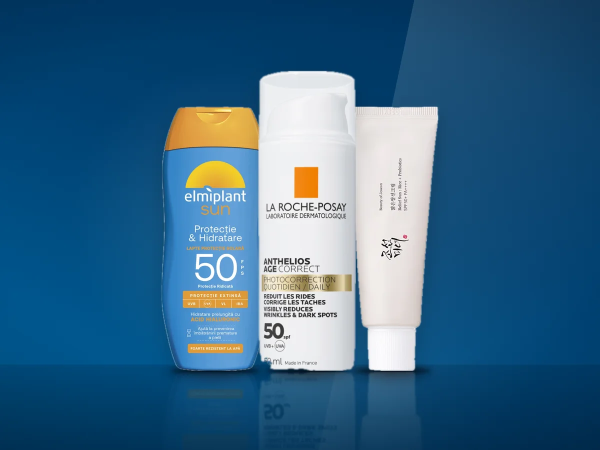Trei produse cu protectie solara: un fluid de fata, un spray de corp si o crema in tub
